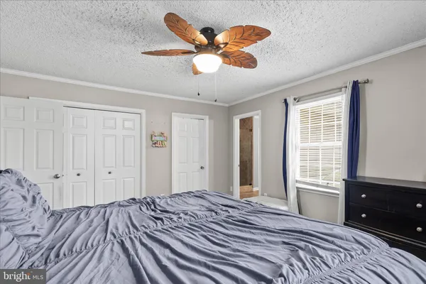 a view of a livingroom with furniture and a flat screen tv