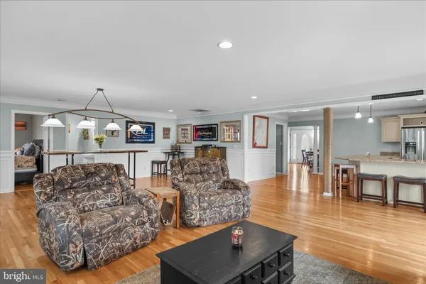 a view of porch with wooden floor