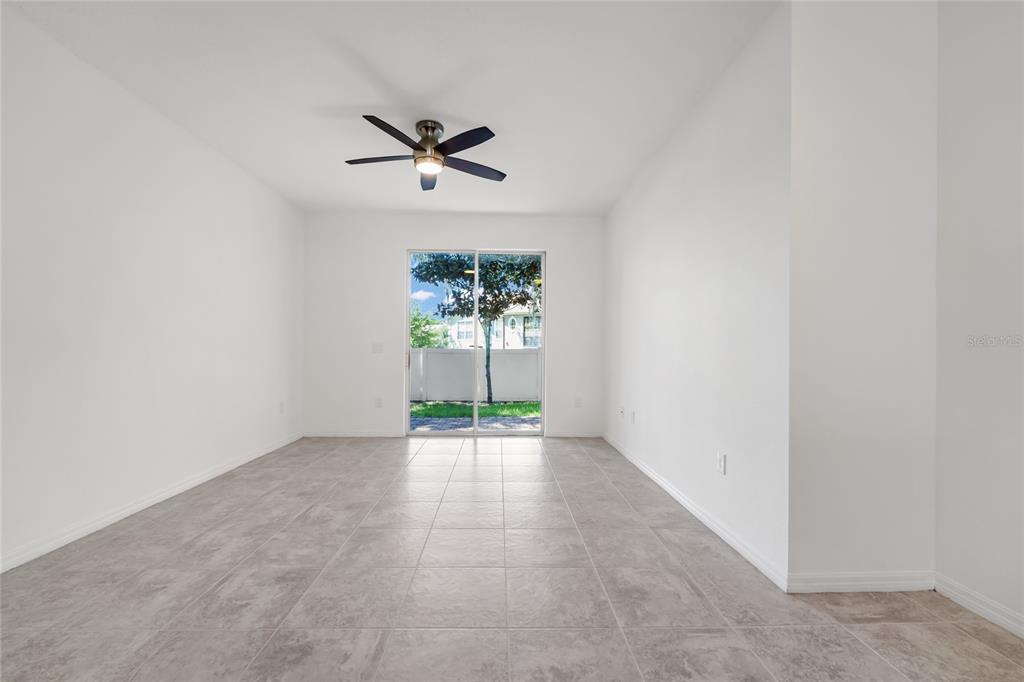4824 Poolside Drive St. Cloud, FL 34769 - Photo 9 of 29 an empty room that has a window in it