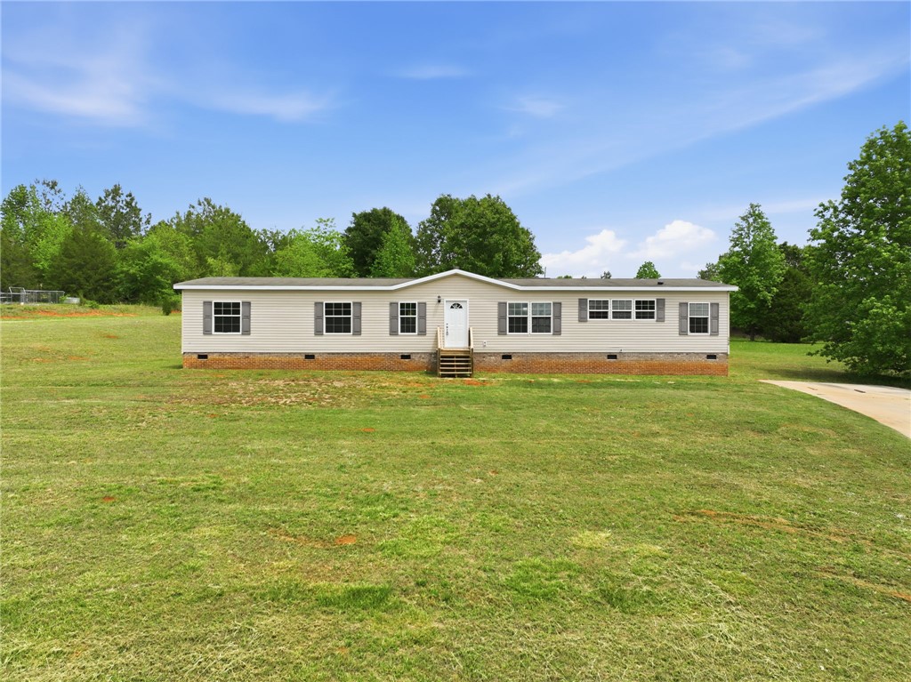 112 Sir Francis Drake Way Liberty, SC 29657 - Photo 1 of 42 This charming residence offers comfortable living amidst a serene, expansive landscape.