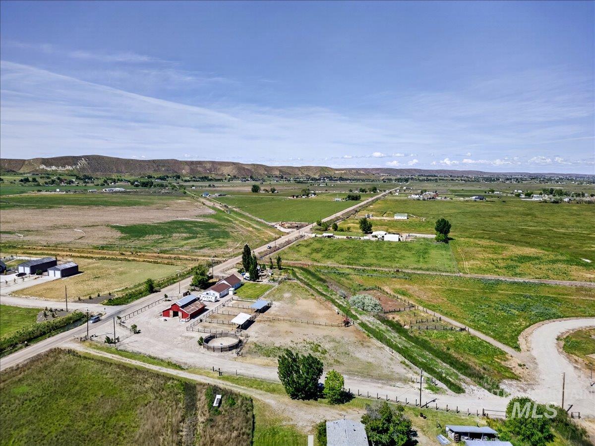 2588 West Sales Yard Road Emmett, ID 83617 - Photo 7 of 49 Expansive rural property featuring multiple structures, an equestrian round pen, and fenced areas