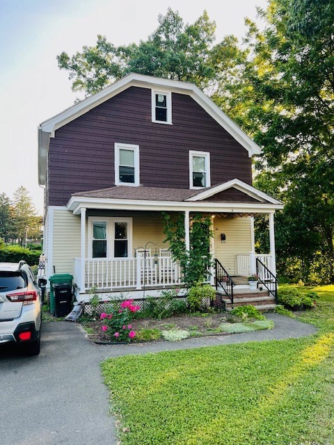 2 Pine Street Chicopee, MA 01020 - Photo 1 of 14 a front view of a house with garden