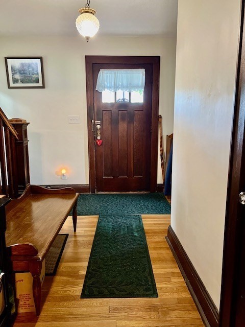 2 Pine Street Chicopee, MA 01020 - Photo 4 of 14 a view of a bedroom with wooden floor and a rug