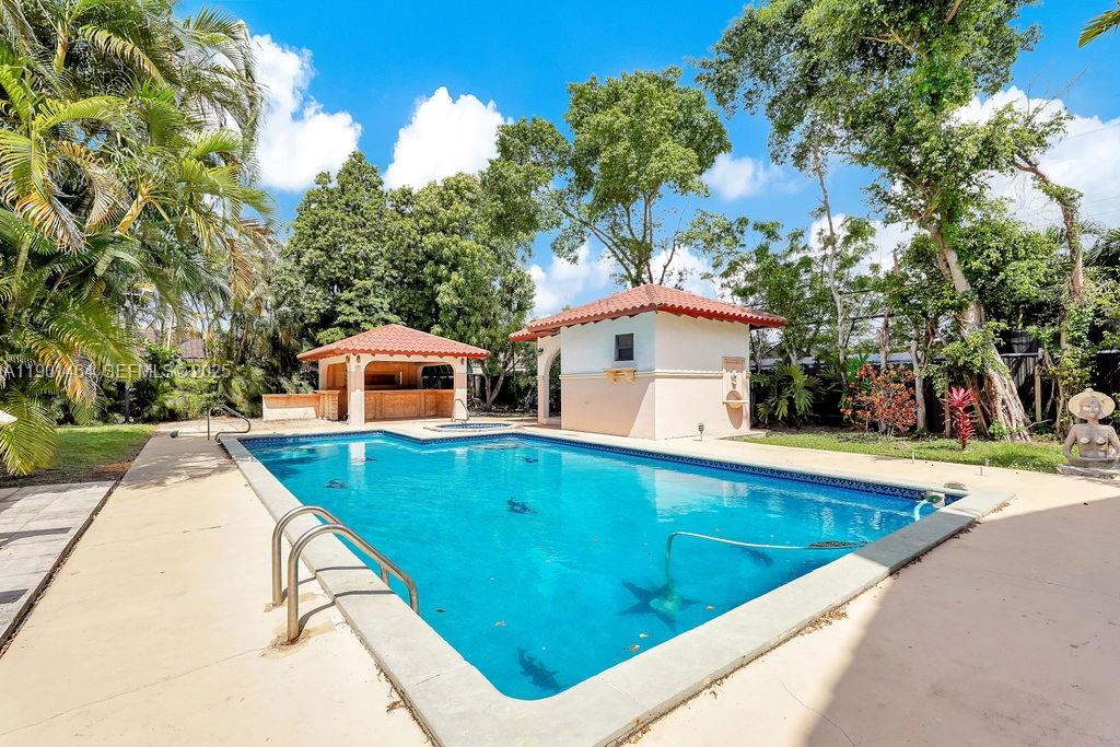 9291 Southwest 36th Street Miami, FL 33165 - Photo 12 of 15 a view of a house with pool