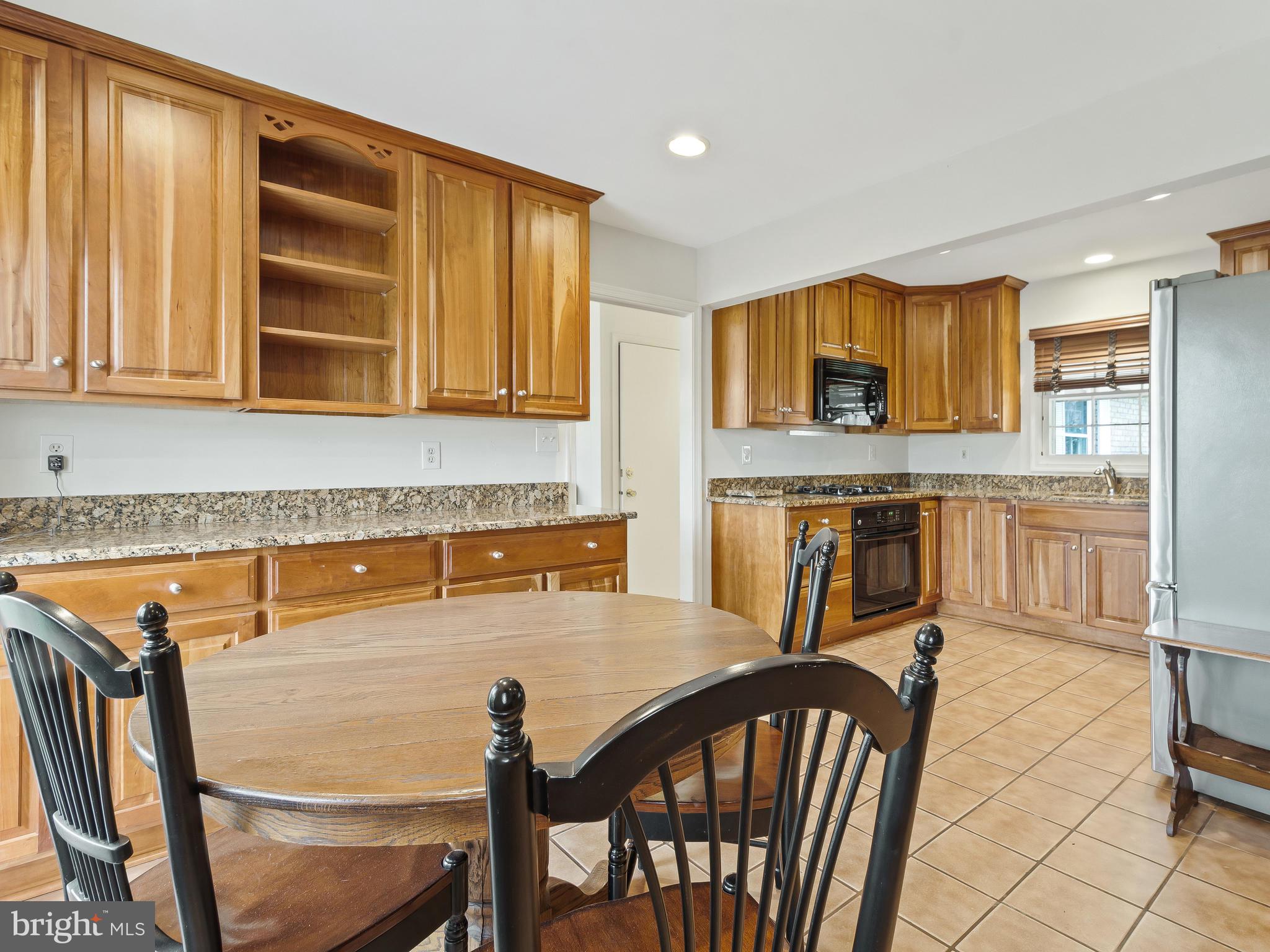 3213 Birchtree Lane Silver Spring, MD 20906 - Photo 11 of 54 Spacious eating area with extra cabinets