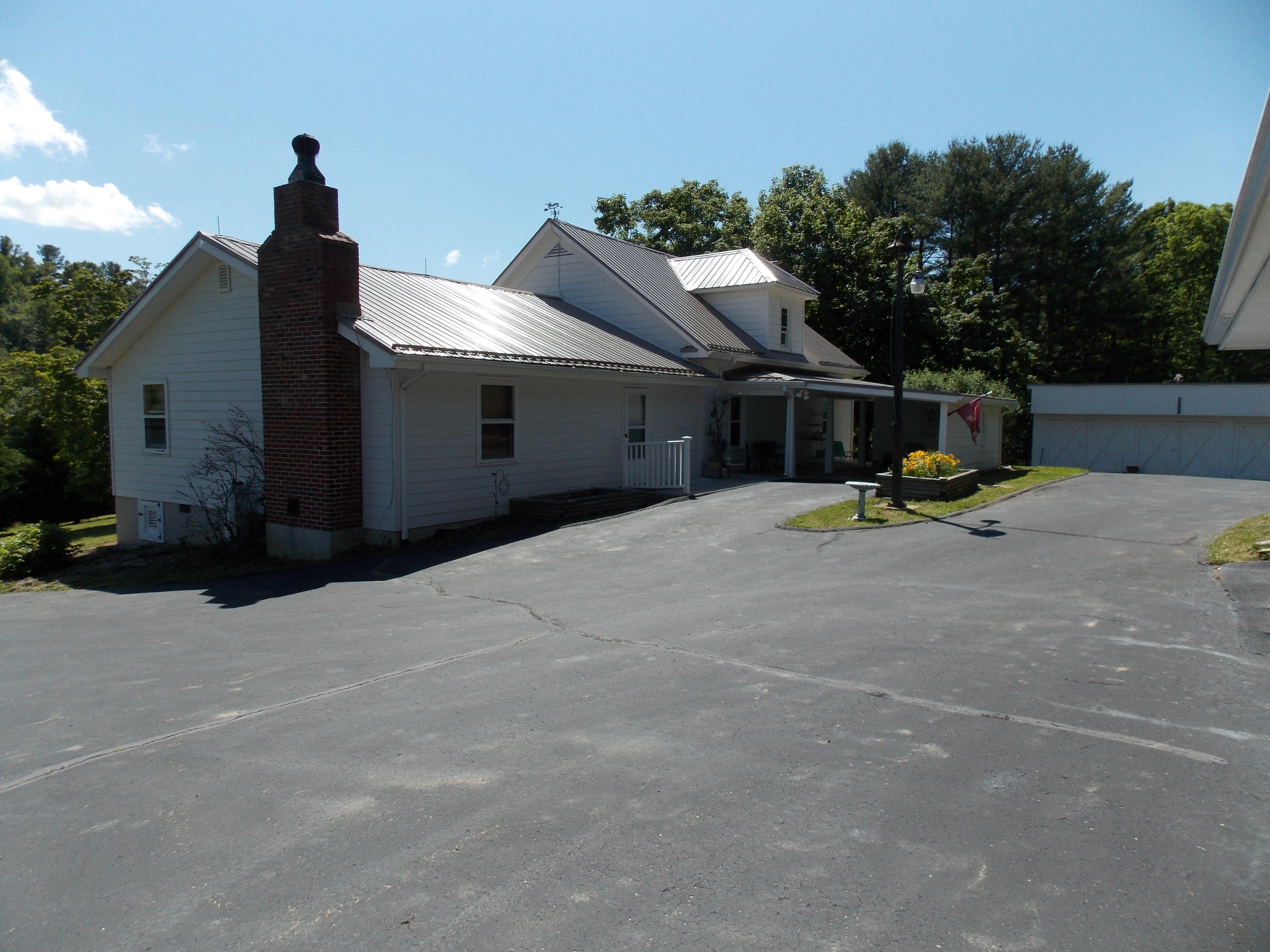 4147 Webbs Mill Road North Riner, VA 24149 - Photo 2 of 53 a view of a house with outdoor space