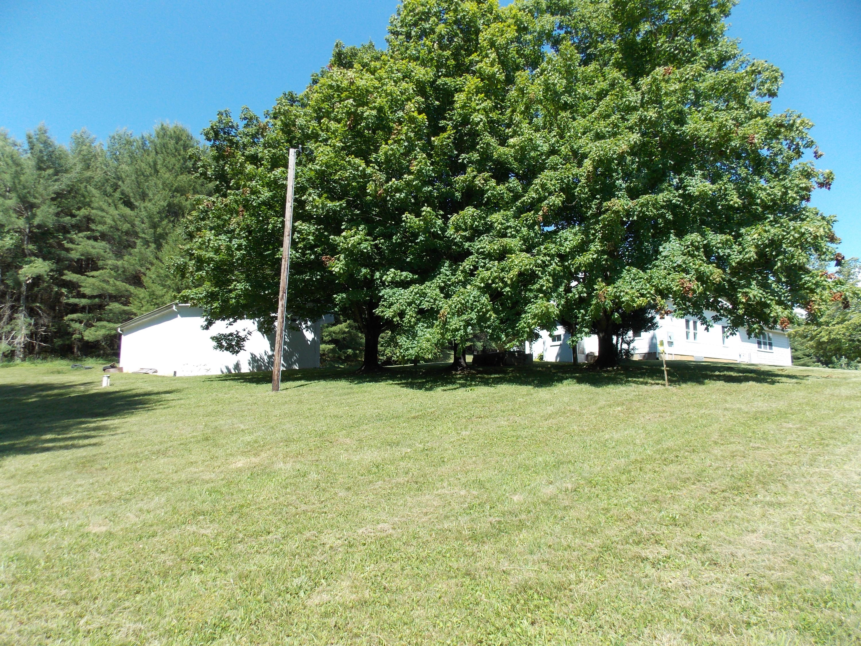 4147 Webbs Mill Road North Riner, VA 24149 - Photo 22 of 53 a front view of a house with a yard
