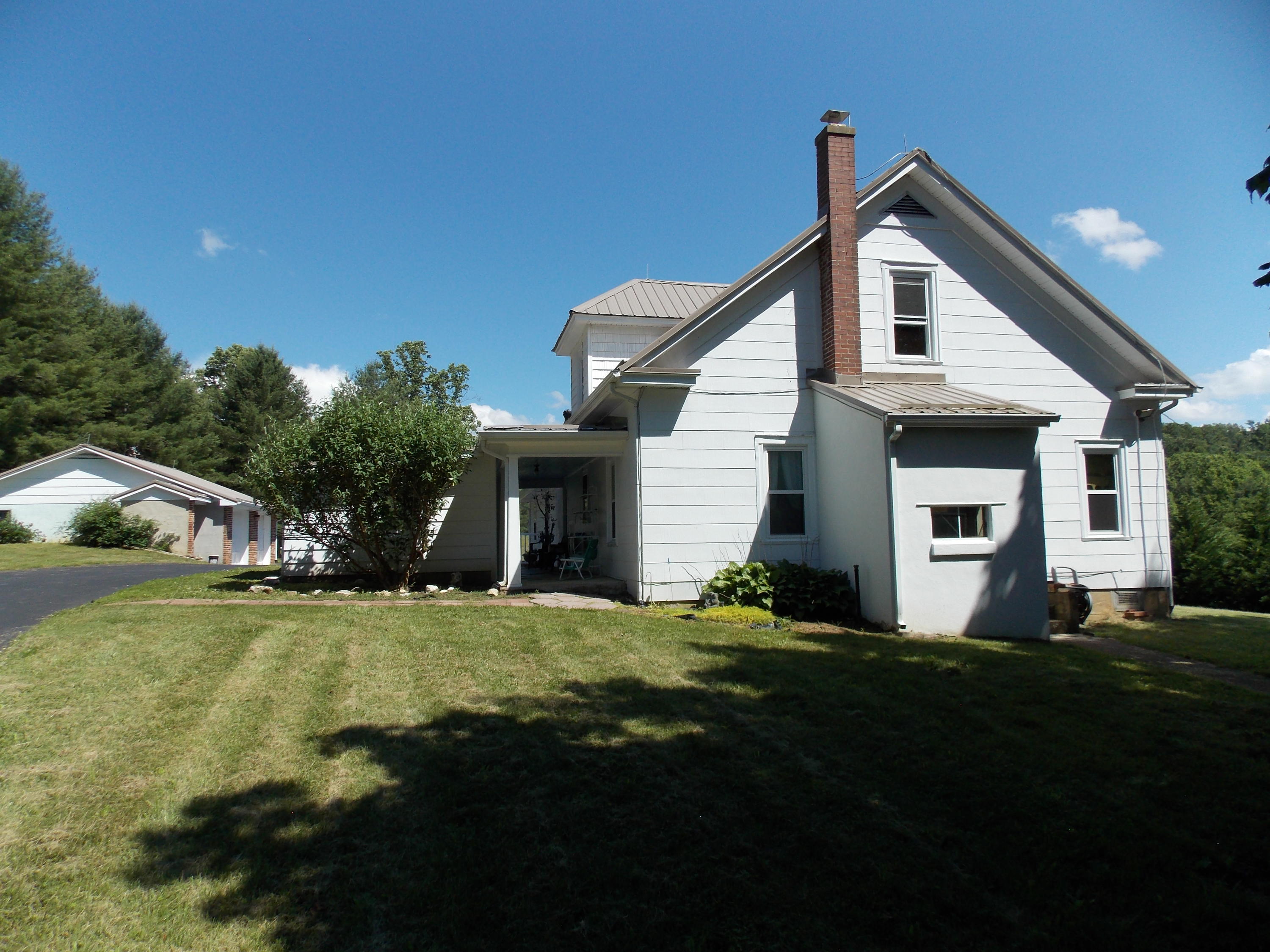 4147 Webbs Mill Road North Riner, VA 24149 - Photo 5 of 53 a front view of a house with a yard