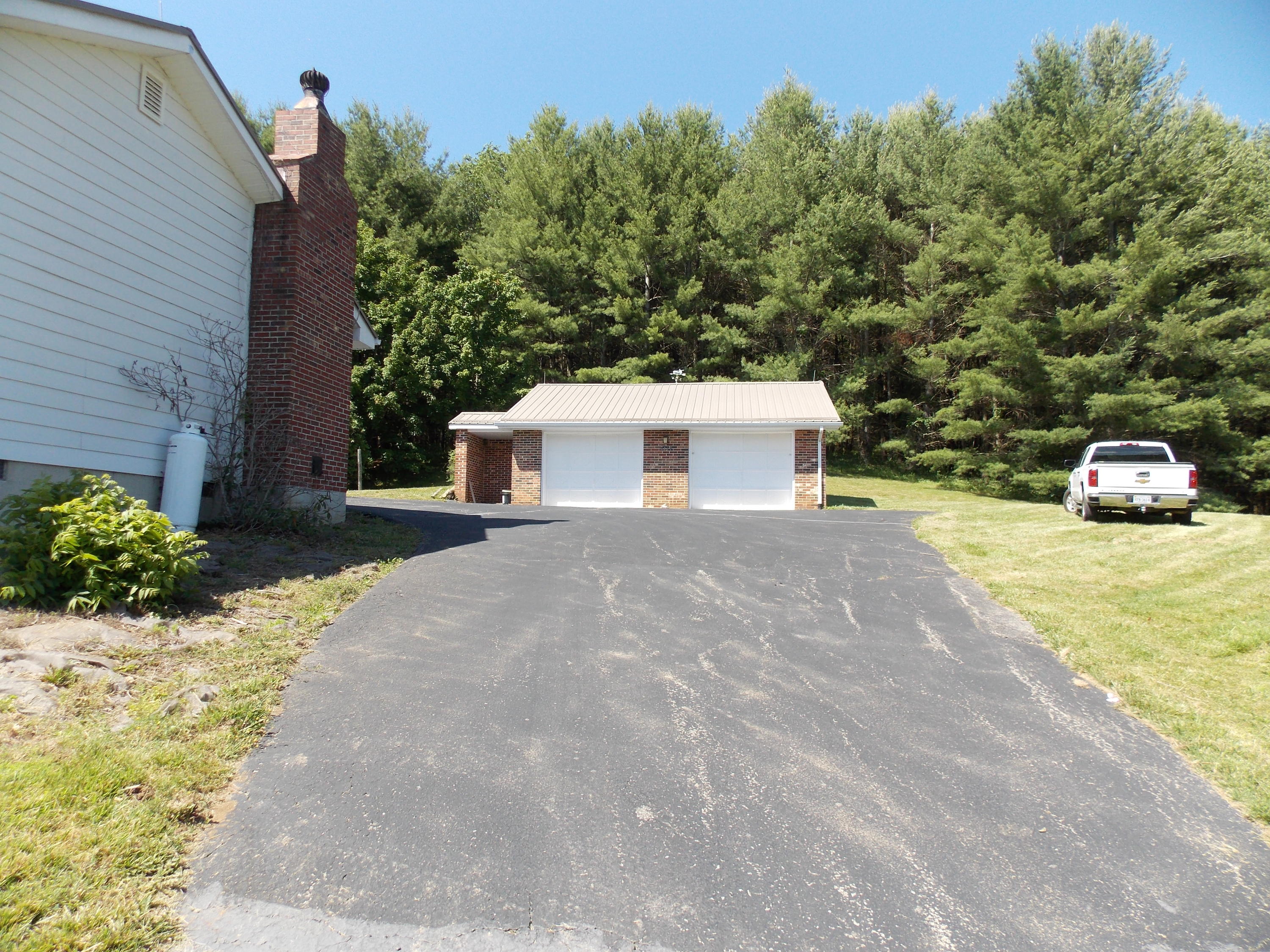 4147 Webbs Mill Road North Riner, VA 24149 - Photo 9 of 53 a house view with a backyard space