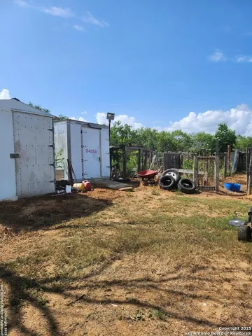 a view of a street with a building in the background