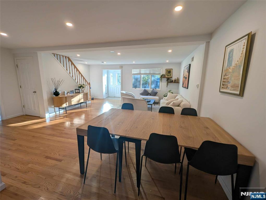 99 Park Avenue Cresskill, NJ 07626 - Photo 13 of 46 a view of a dining room with furniture and wooden floor