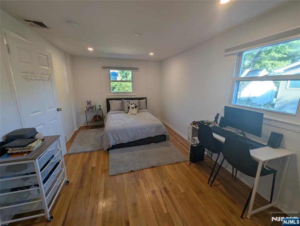 99 Park Avenue Cresskill, NJ 07626 - Photo 41 of 46 a bedroom with a bed and a desk