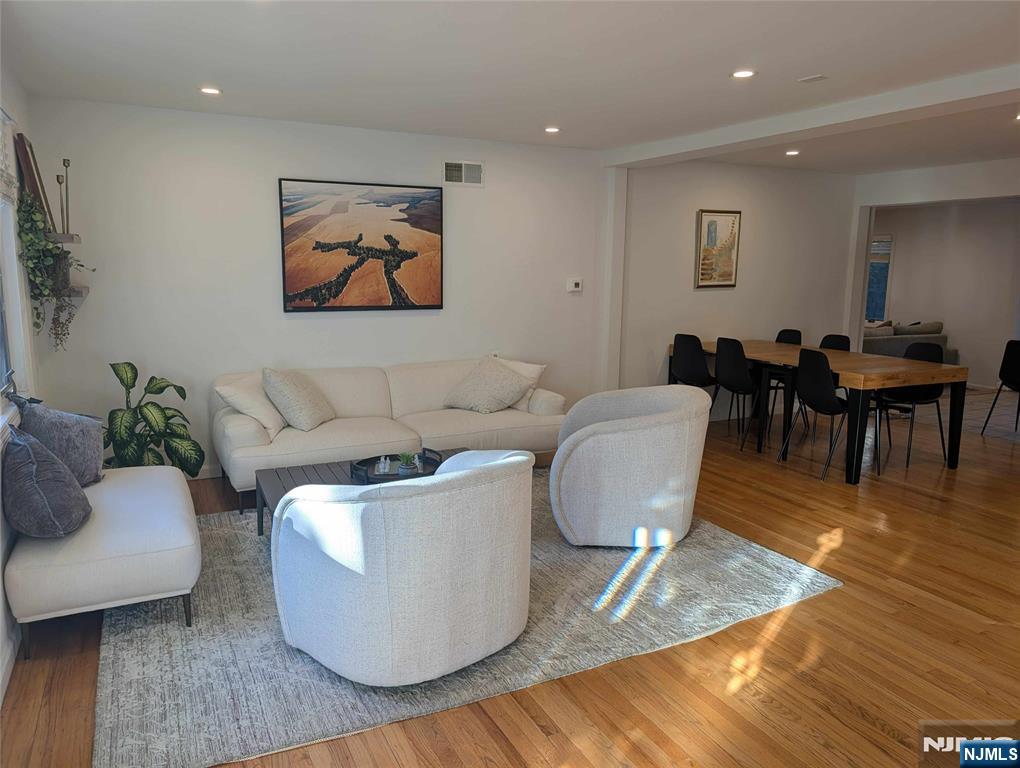 99 Park Avenue Cresskill, NJ 07626 - Photo 6 of 46 a living room with furniture and wooden floor