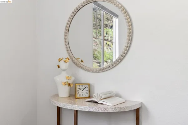 a view of a workspace with furniture