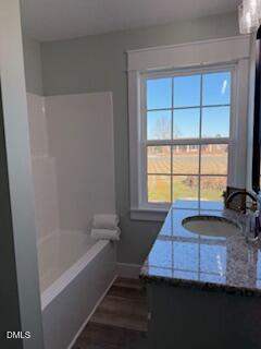 3055 Autry Mill Road Godwin, NC 28344 - Photo 17 of 21 a bathroom with a sink and a bathtub