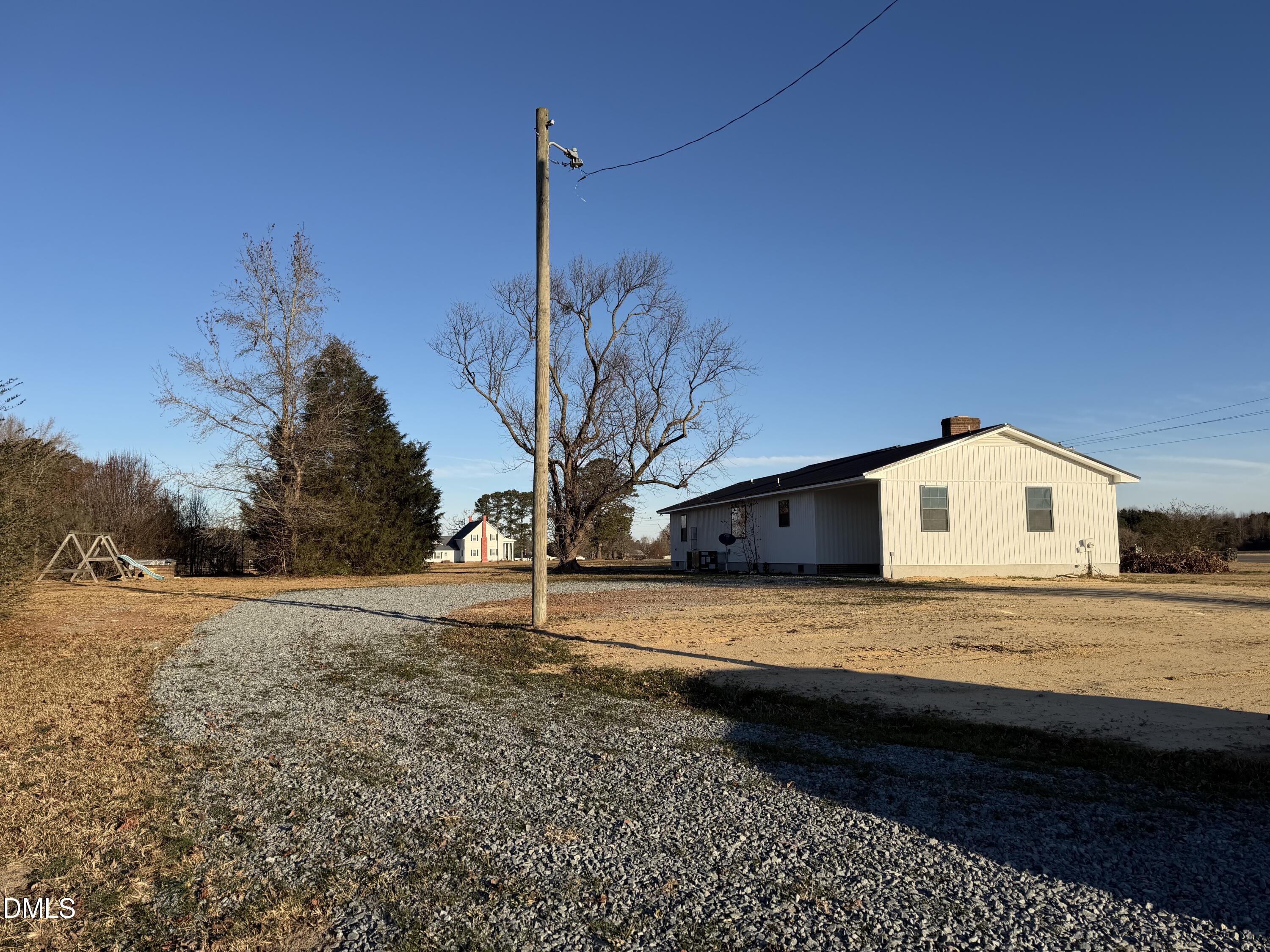 3055 Autry Mill Road Godwin, NC 28344 - Photo 2 of 18 side and rear of home