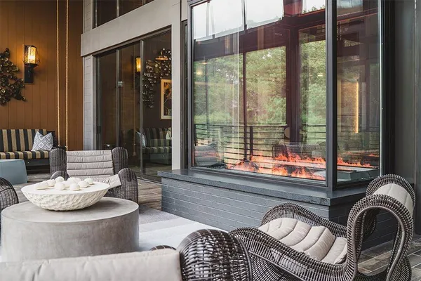 a view of a gallery with wooden floor