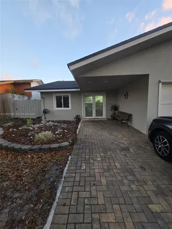 a view of a house with a patio