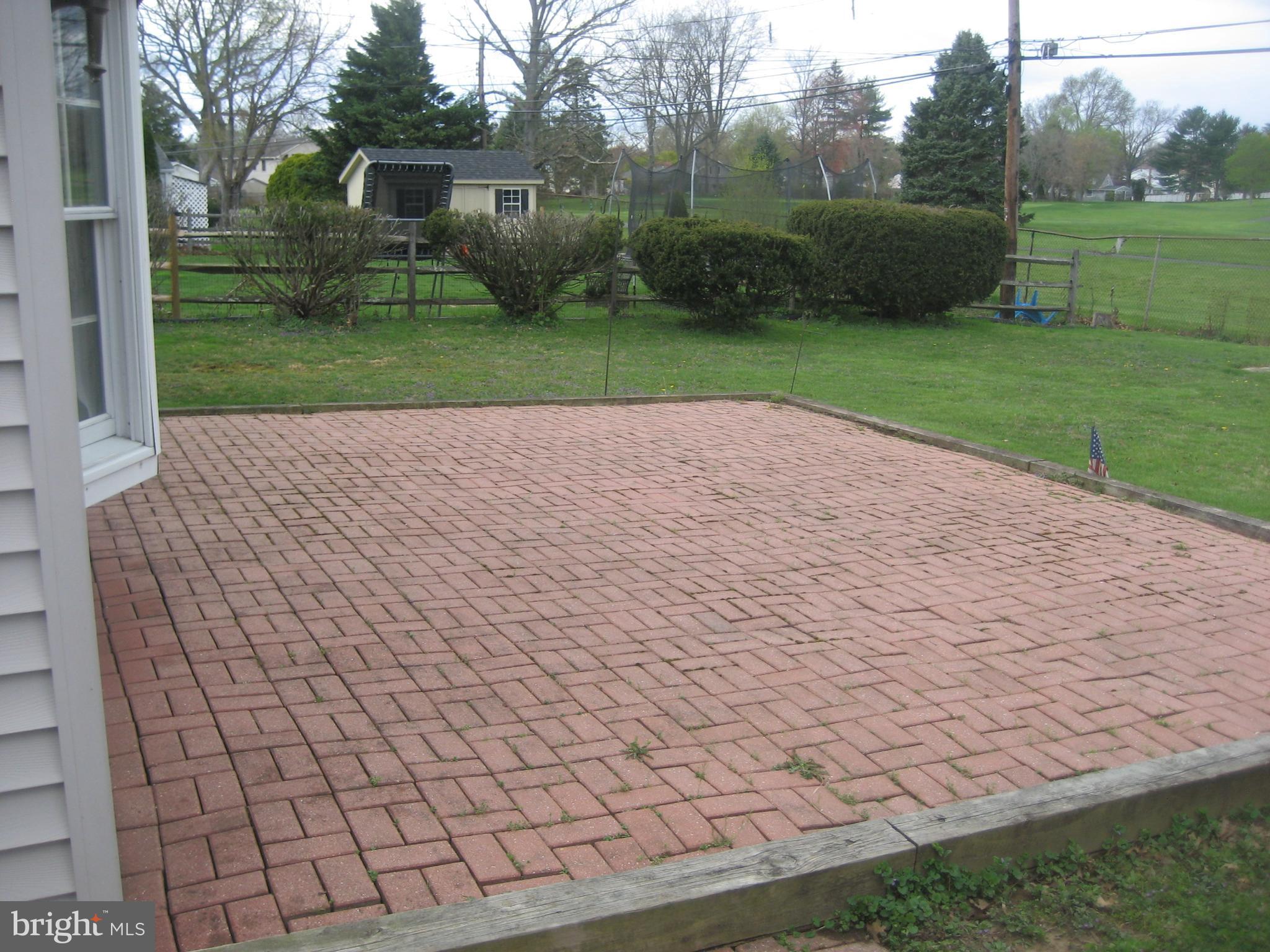 401 Burton Road Oreland, PA 19075 - Photo 27 of 32 Rear Brick Patio