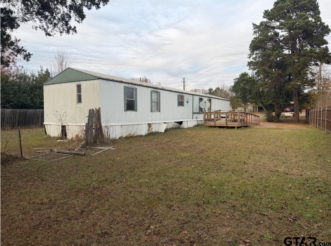 12611 Fannin Parkway Tyler, TX 75708 - Photo 3 of 15 a view of a house with backyard