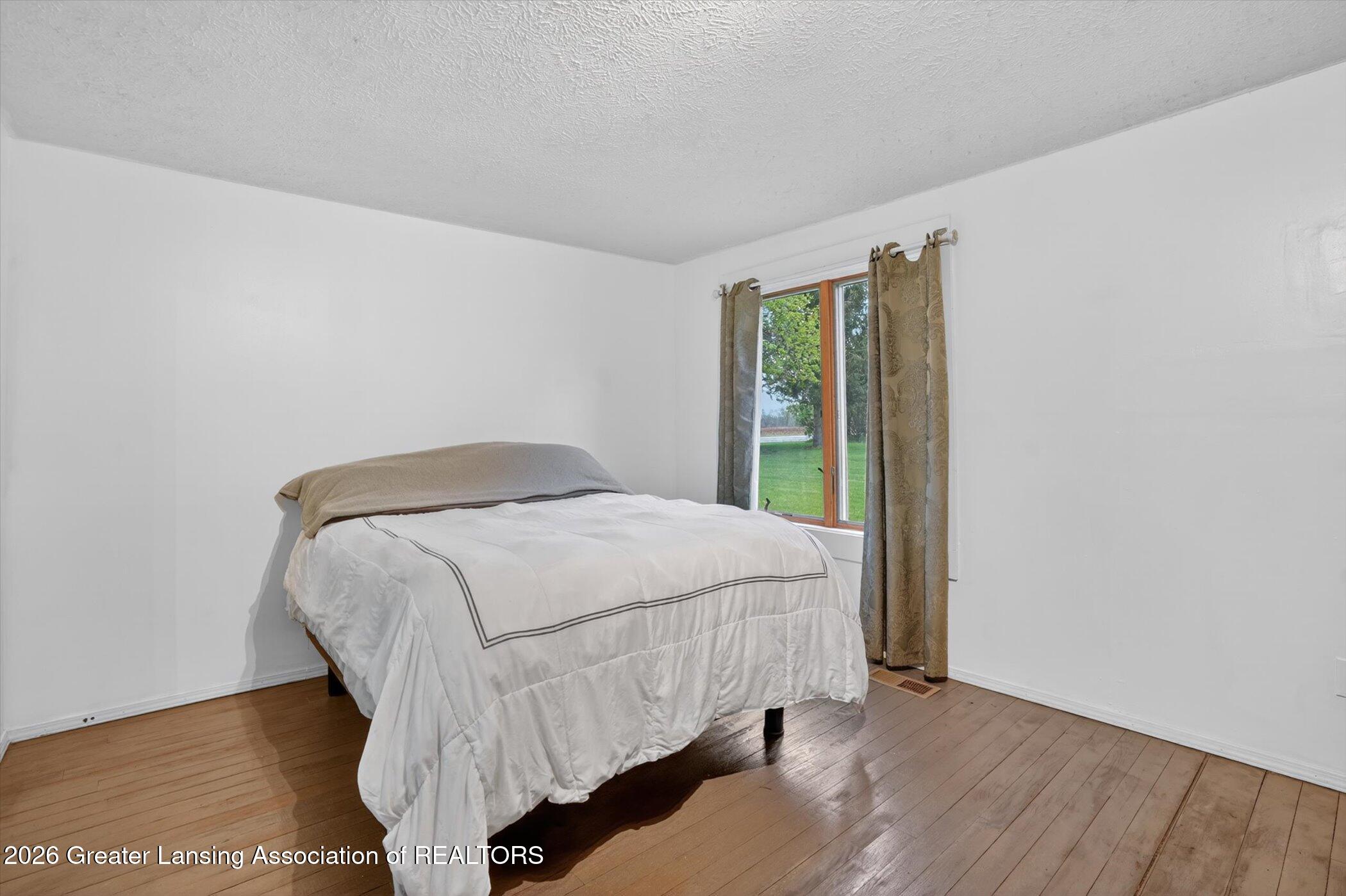 6834 North Wacousta Road Fowler, MI 48835 - Photo 23 of 51 23-6834-N-Wacousta-Rd-WindowStill-Photog
