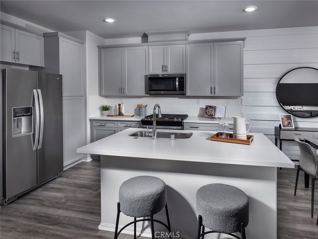 4891 Merida Way Oceanside, CA 92057 - Photo 2 of 19 Photo is not of the actual home, but is an inspirational photo of builder’s model home and may depict options, furnishings, and/or decorator features that are not included