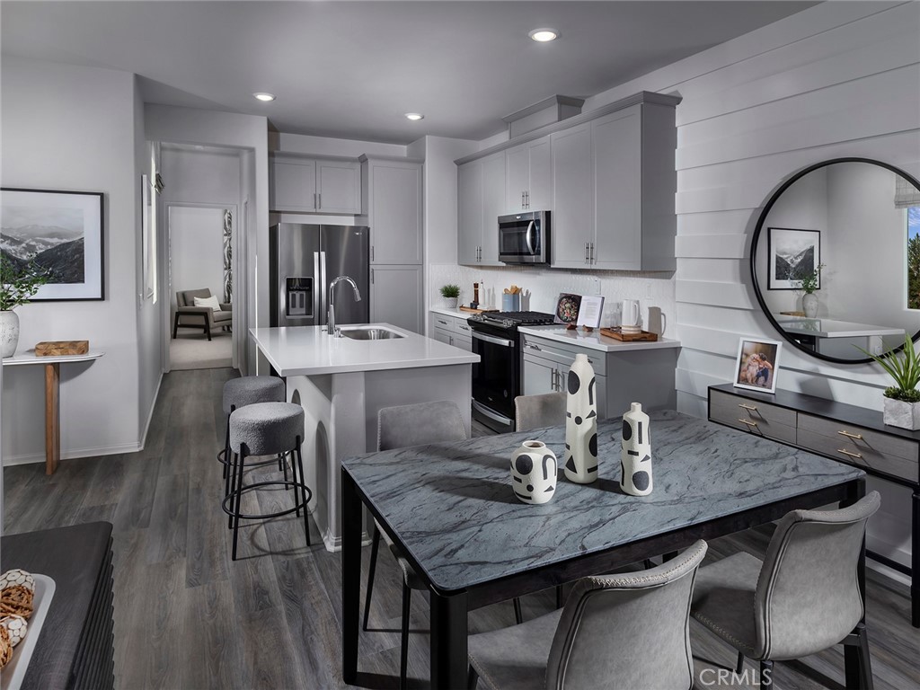 4891 Merida Way Oceanside, CA 92057 - Photo 6 of 19 Photo is not of the actual home, but is an inspirational photo of builder’s model home and may depict options, furnishings, and/or decorator features that are not included