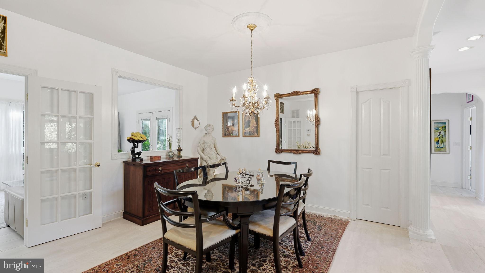 143 Edgemont Circle Locust Grove, VA 22508 - Photo 21 of 85 a view of a dining room with furniture and chandelier