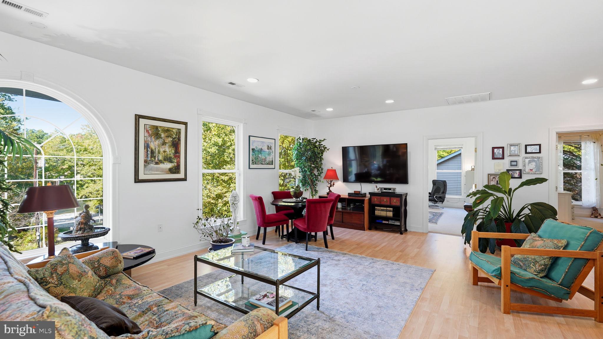 143 Edgemont Circle Locust Grove, VA 22508 - Photo 32 of 85 a living room with furniture a flat screen tv and a fireplace