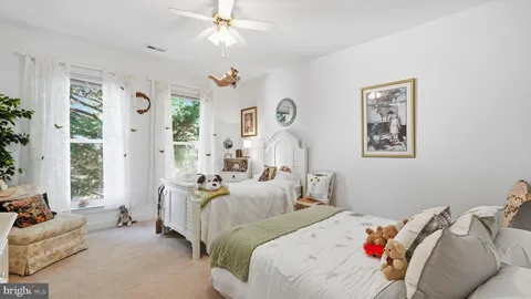 a view of a terrace with couches and pool