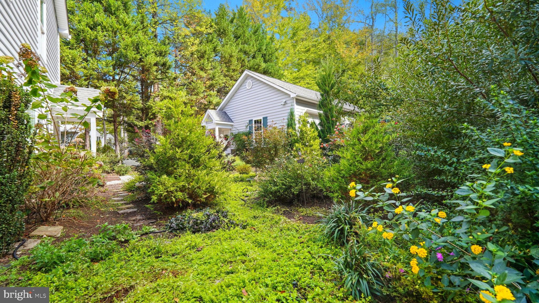 143 Edgemont Circle Locust Grove, VA 22508 - Photo 47 of 80 a view of a house with a tree and a yard