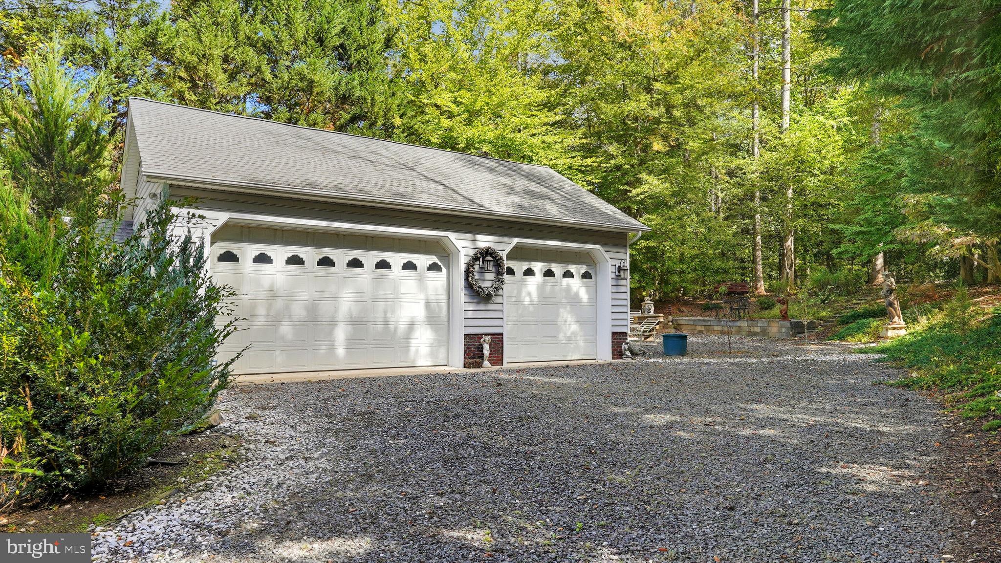 143 Edgemont Circle Locust Grove, VA 22508 - Photo 49 of 80 a front view of a house with a garden