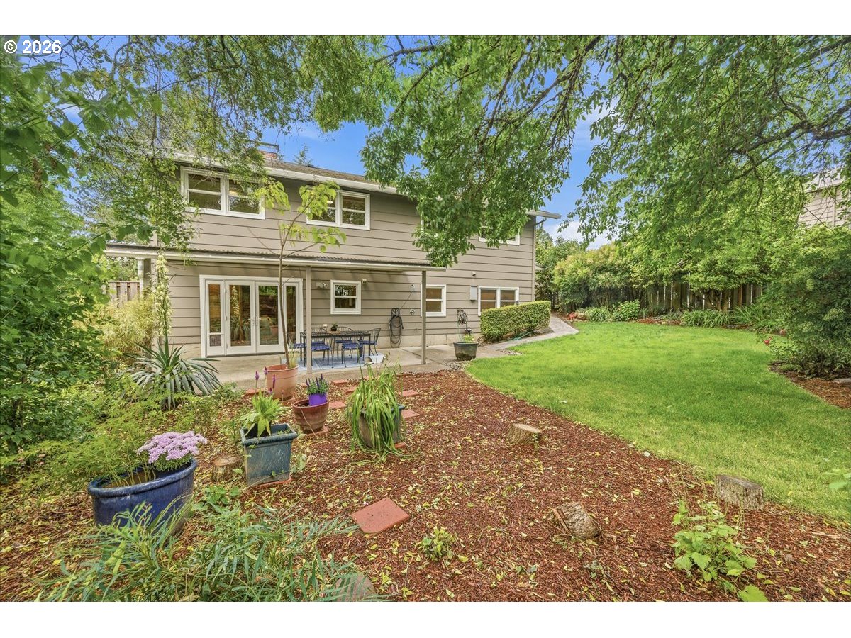 3130 Southwest 116th Avenue Beaverton, OR 97005 - Photo 35 of 44 a view of a house with backyard and garden