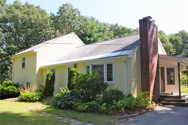 344 Hudson Road Stow, MA 01775 - Photo 1 of 28 a house view with a garden space