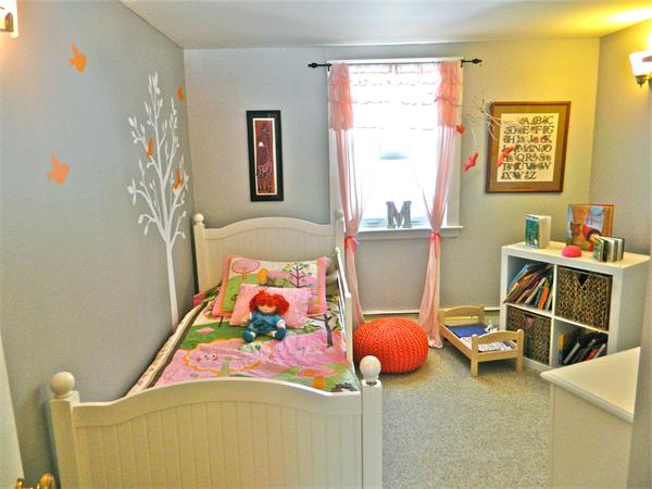 344 Hudson Road Stow, MA 01775 - Photo 9 of 28 a bedroom with a bed and a chandelier