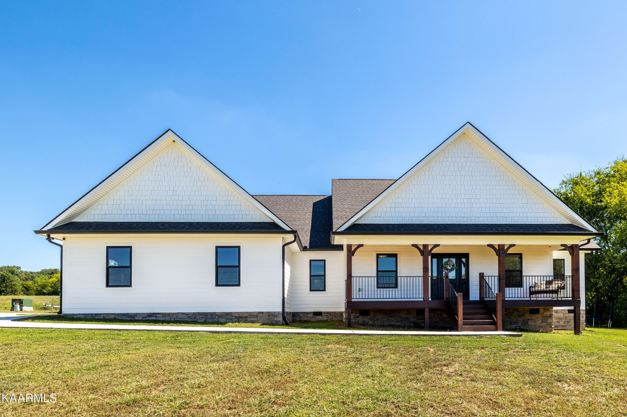 4385 Niles Ferry Road Greenback, TN 37742 - Photo 1 of 51 a front view of a house with a yard