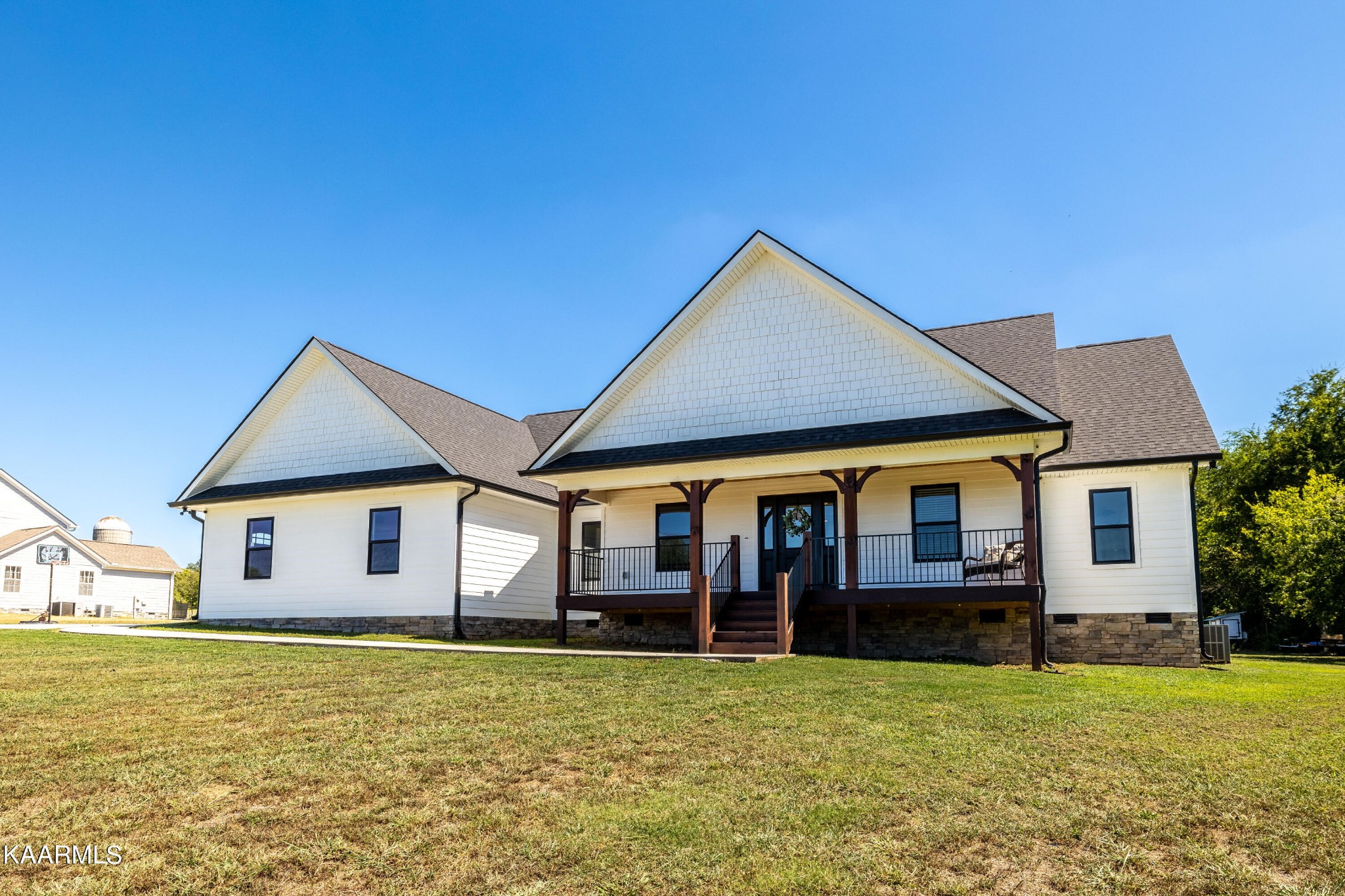 4385 Niles Ferry Road Greenback, TN 37742 - Photo 3 of 51 a view of a house with a swimming pool