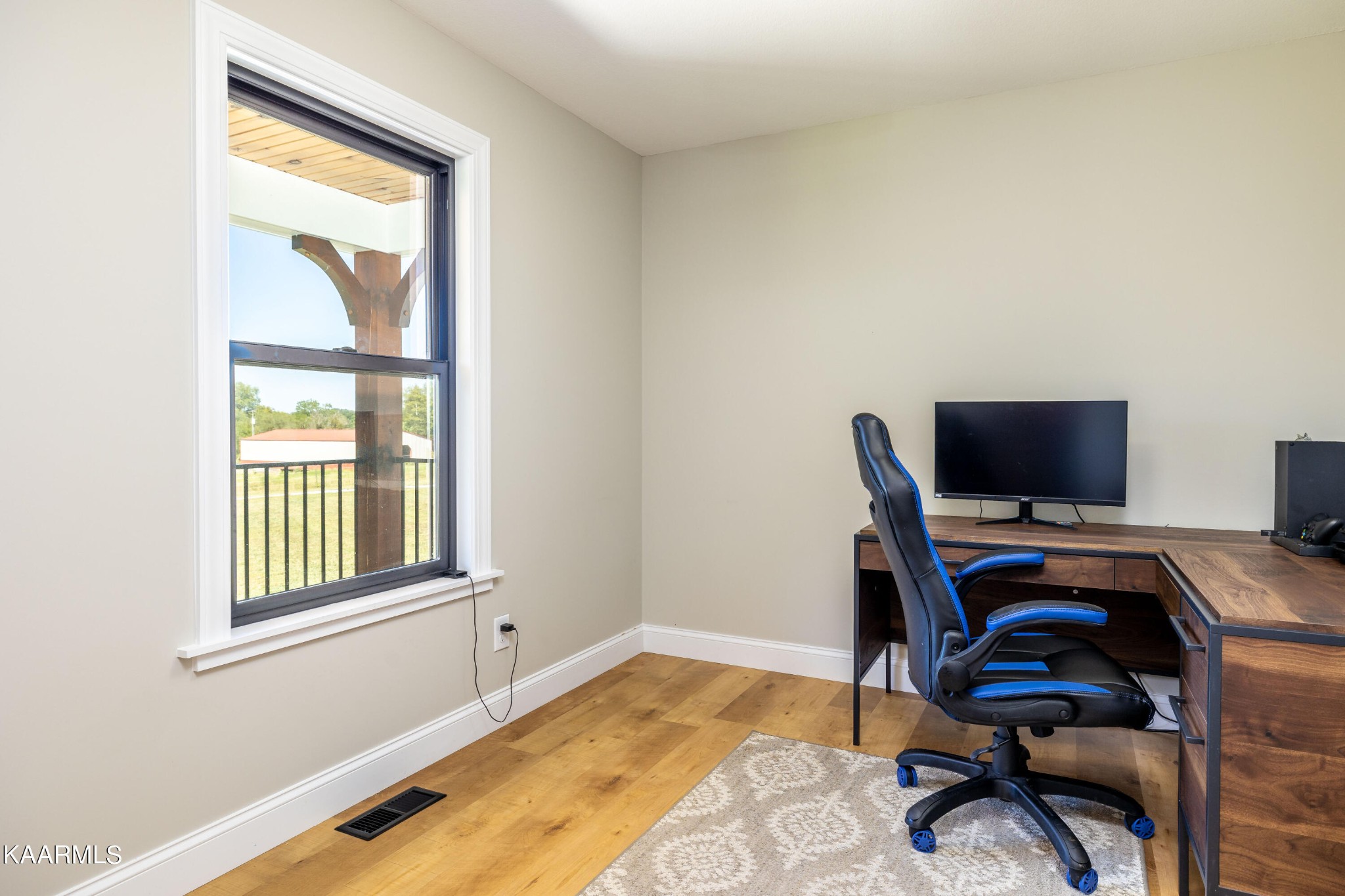 4385 Niles Ferry Road Greenback, TN 37742 - Photo 31 of 51 a view of a workspace with furniture and a window