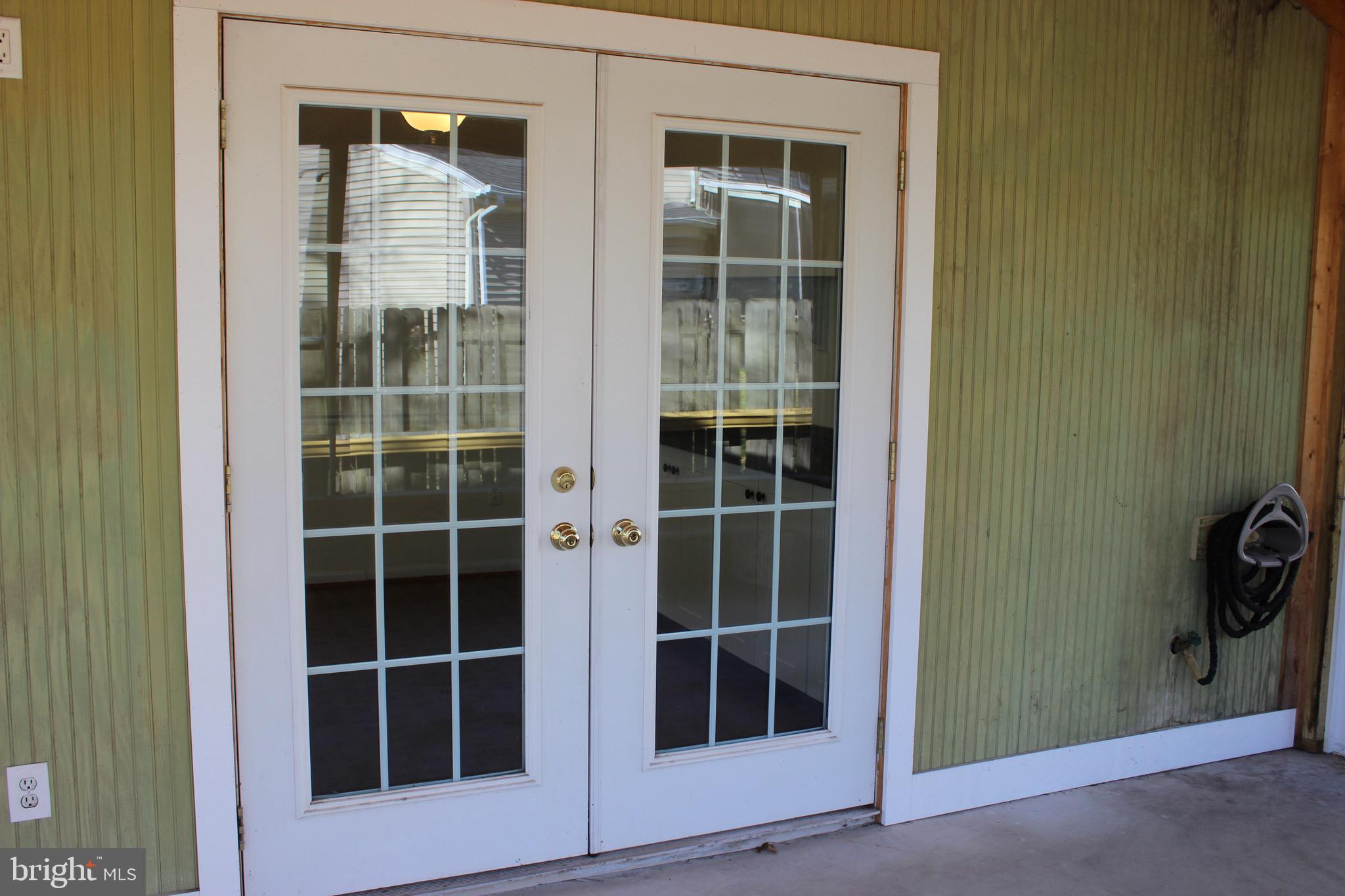12716 Builders Road Herndon, VA 20170 - Photo 23 of 30 French doors lead you to the screened porch