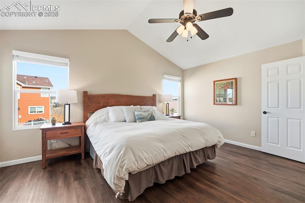 8318 Shadow Run Lane Fountain, CO 80817 - Photo 23 of 50 a bedroom with a bed and a chandelier