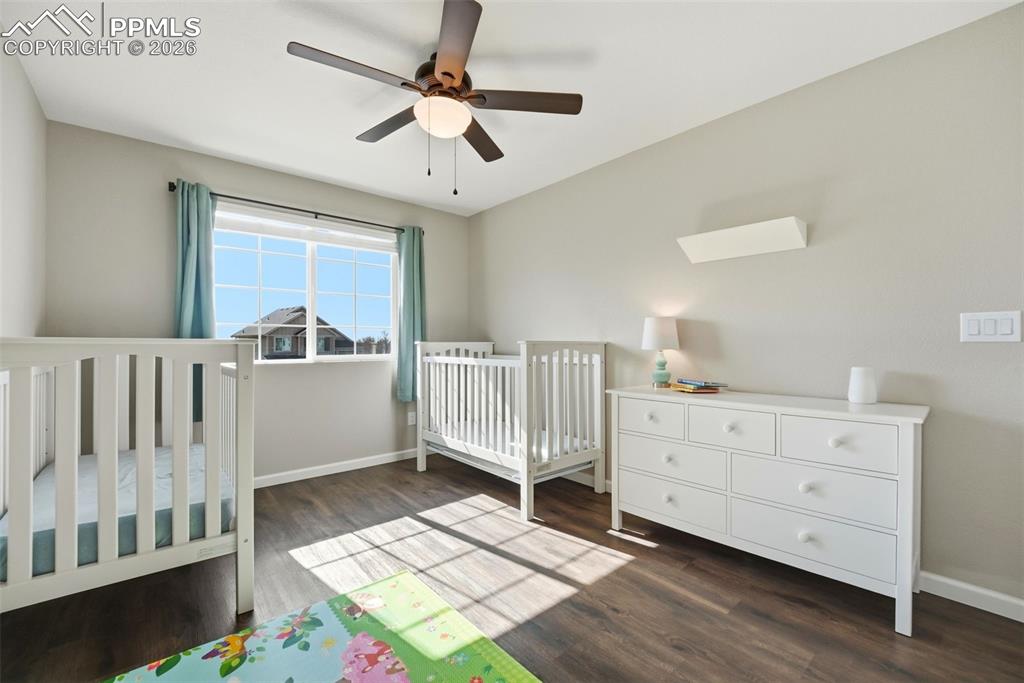 8318 Shadow Run Lane Fountain, CO 80817 - Photo 27 of 50 a bed room with a bed and a window