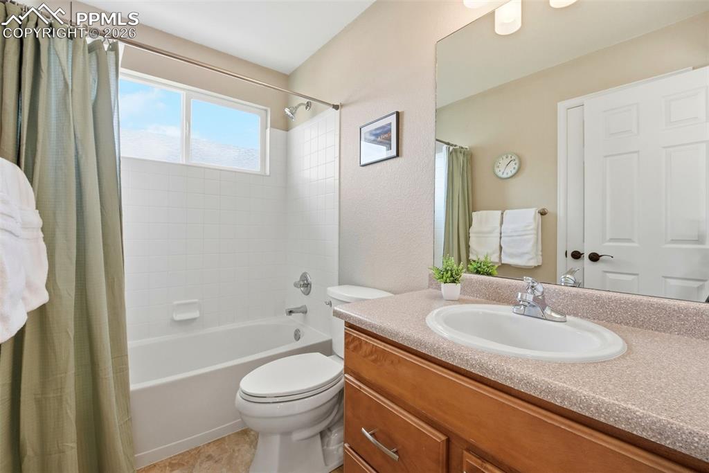 8318 Shadow Run Lane Fountain, CO 80817 - Photo 28 of 50 a bathroom with a sink a toilet and shower