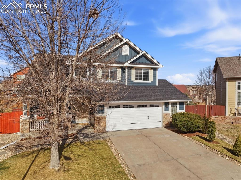 8318 Shadow Run Lane Fountain, CO 80817 - Photo 41 of 50 a front view of a house with a yard