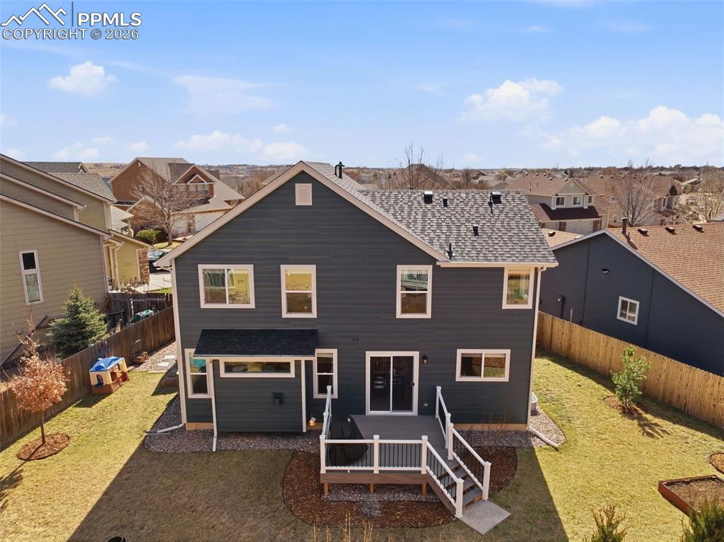 8318 Shadow Run Lane Fountain, CO 80817 - Photo 45 of 50 a view of a house with a yard
