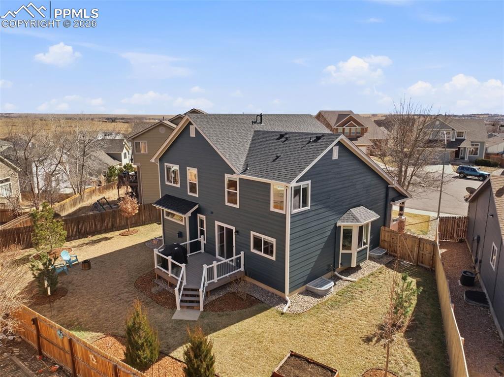 8318 Shadow Run Lane Fountain, CO 80817 - Photo 46 of 50 an aerial view of a house with wooden deck