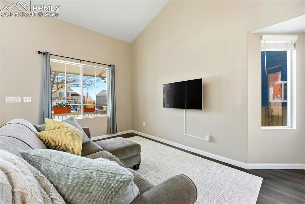 8318 Shadow Run Lane Fountain, CO 80817 - Photo 5 of 50 a living room with furniture and a flat screen tv