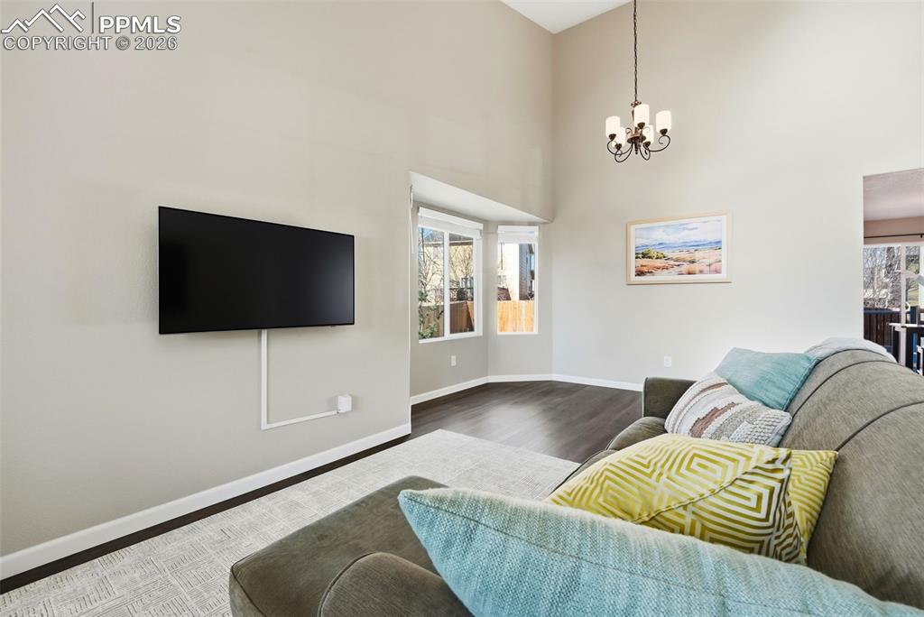 8318 Shadow Run Lane Fountain, CO 80817 - Photo 6 of 50 a living room with furniture and a flat screen tv