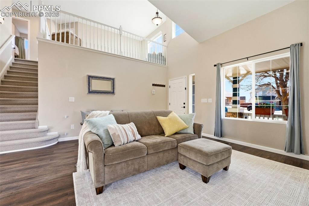 8318 Shadow Run Lane Fountain, CO 80817 - Photo 8 of 50 a living room with furniture and a window