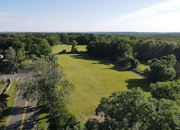 408 Scotland Road Norwich, CT 06360 - Photo 2 of 5 a view of a lake in middle of forest