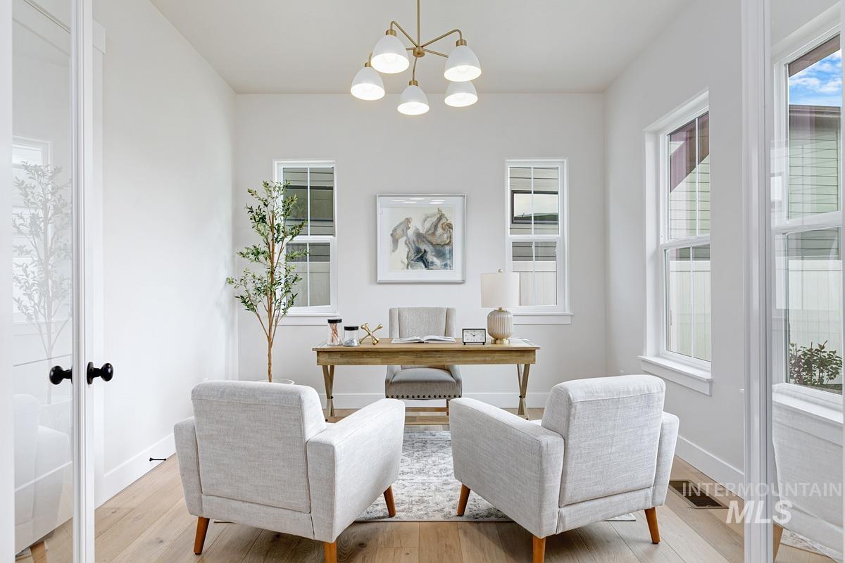 6774 Saddle Bred Way Star, ID 83669 - Photo 18 of 41 Office space featuring a chandelier, light wood finished floors, and french doors